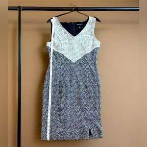 "White House Black Market Dress - Size 8, Stylish V-Neck with Modern Patterns"